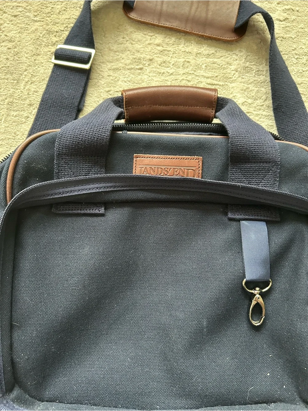 Lands’ End direct merchants navy travel bag with removable shoulder strap